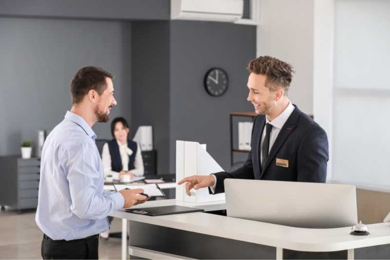 visitor-checking-in-at-guest-management